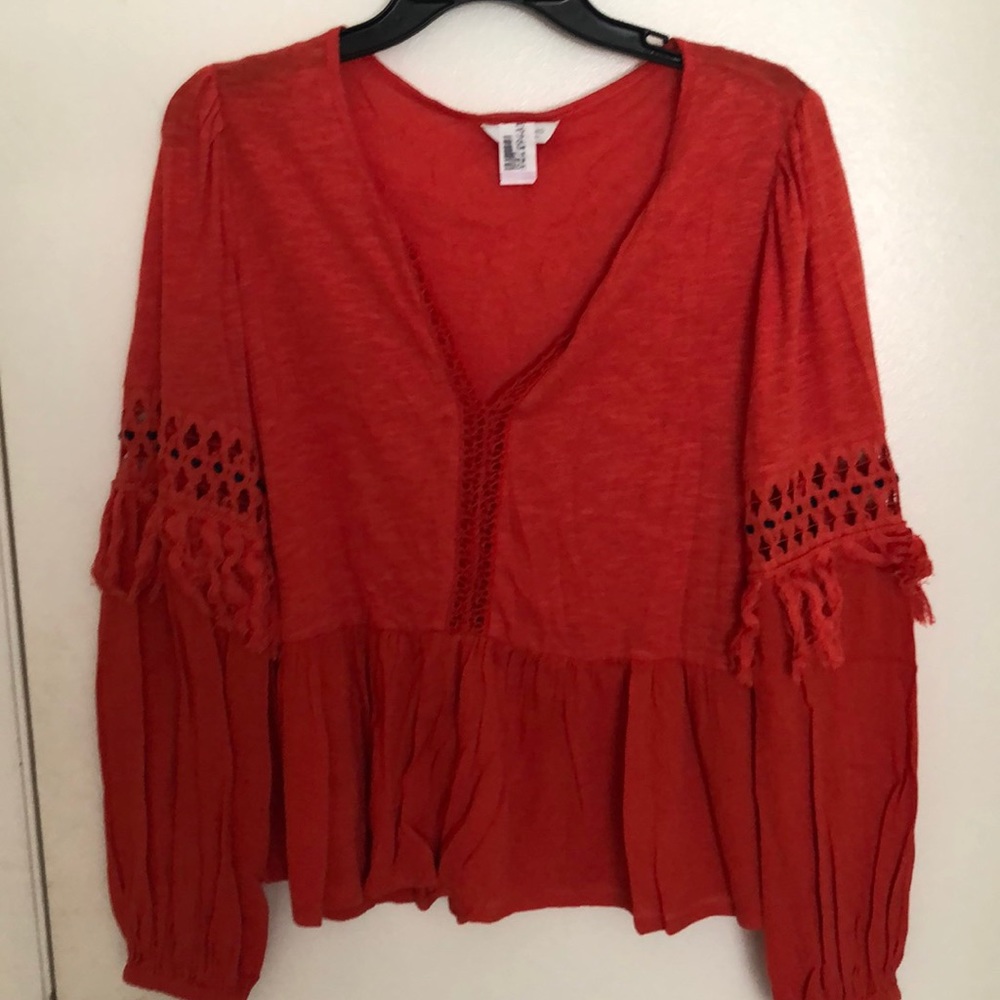 Orange flutter top